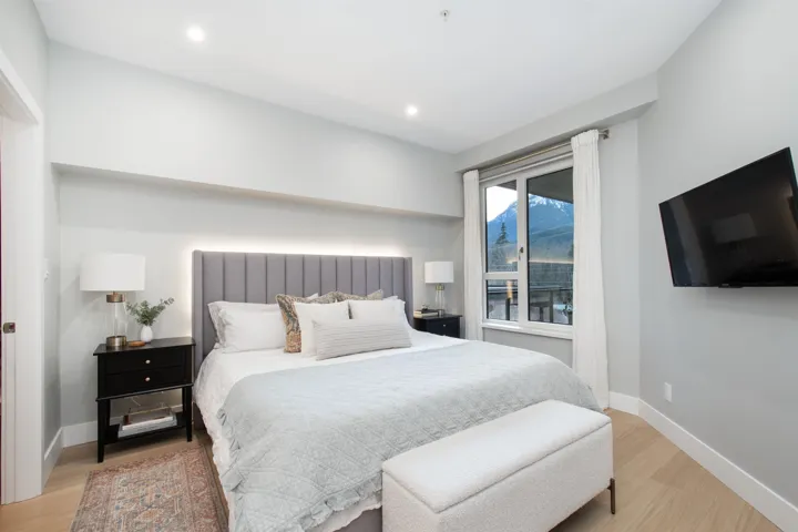 Bedroom with recessed lighting, light wood finished floors, and baseboards