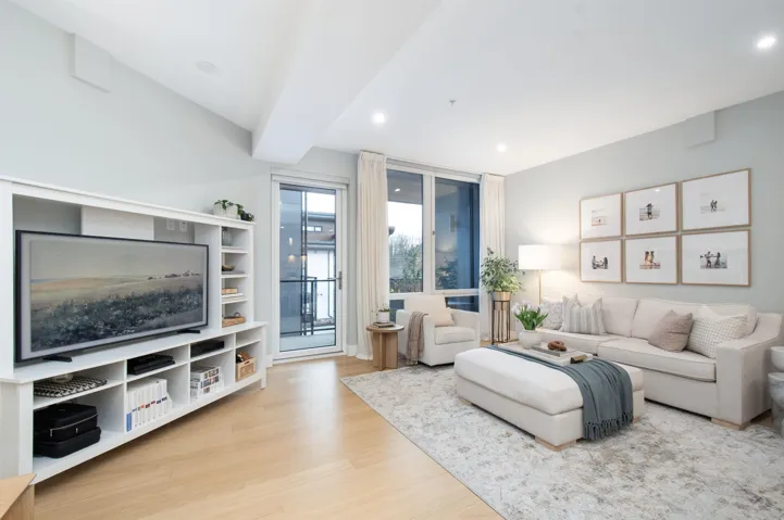 Living area featuring recessed lighting and wood finished floors