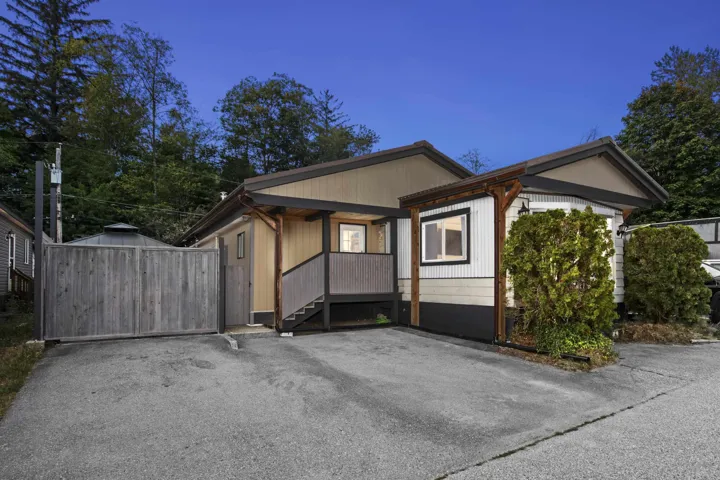 View of front of home with a deck