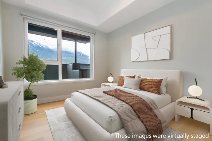Bedroom featuring light wood-type flooring and baseboards
