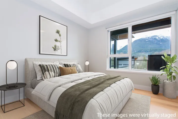 Bedroom featuring baseboards and wood finished floors