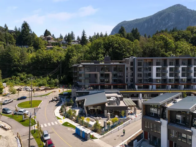 Aerial view of mountains and apartment complex