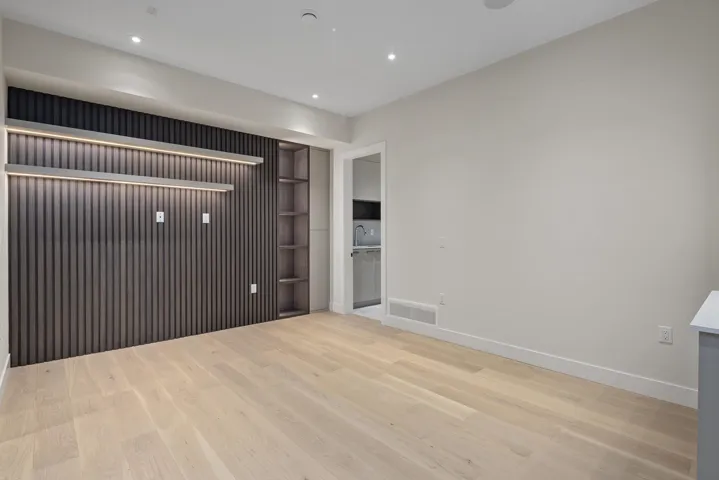 Unfurnished bedroom featuring light wood-type flooring and recessed lighting