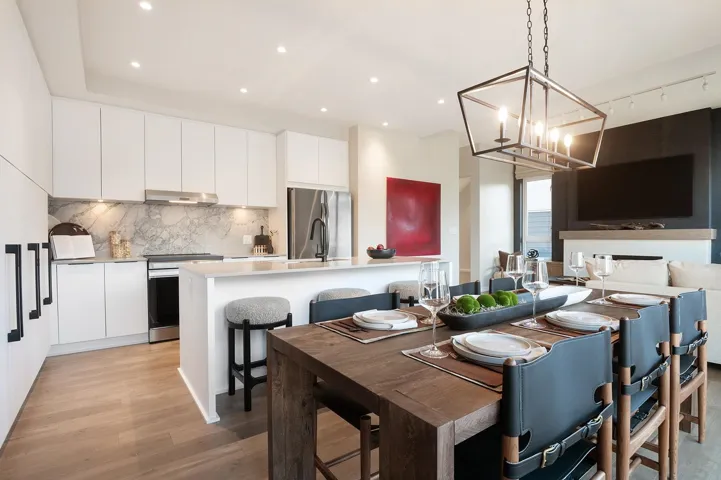 Open-concept living space featuring a contemporary kitchen and dining area