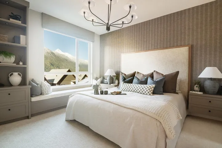 Expansive window offering mountain scenery, complemented by a built-in window seat