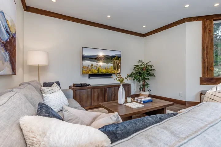 Living area featuring recessed lighting and wood finished floors