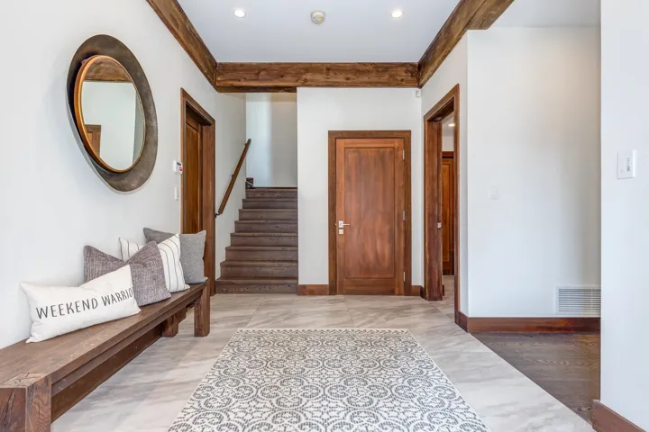 Entrance foyer with stairs, recessed lighting, and light tile patterned floors