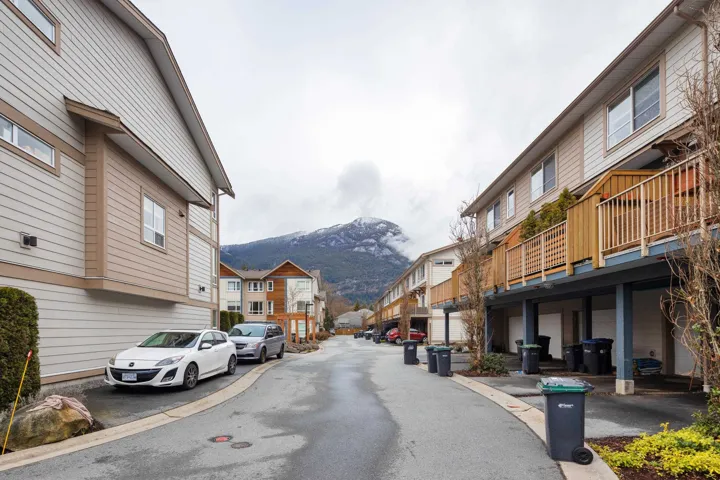 View of road with a residential view and a mountain view