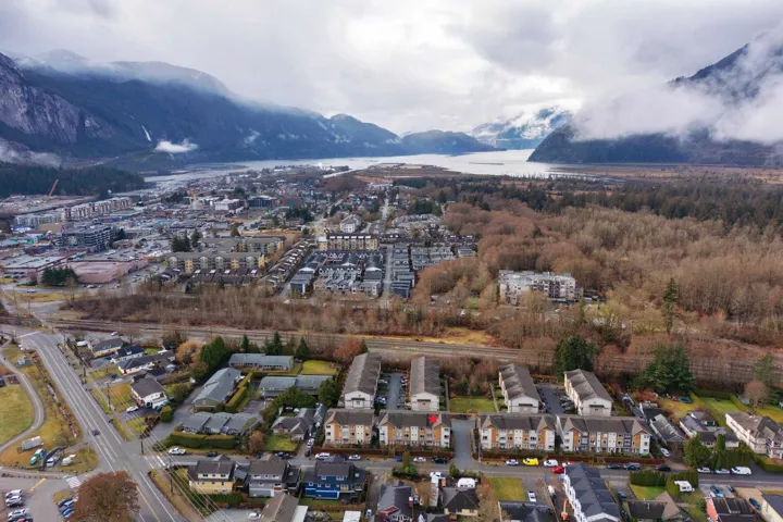 Aerial view featuring a water and mountain view