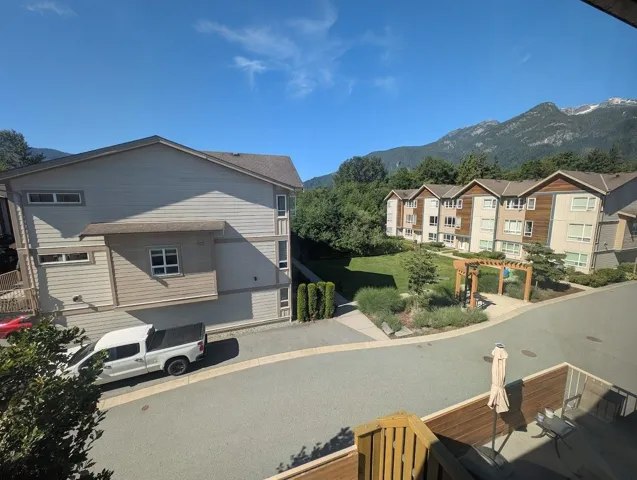 View of asphalt street featuring a mountain view