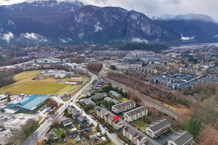 Birds eye view of property with a mountain view