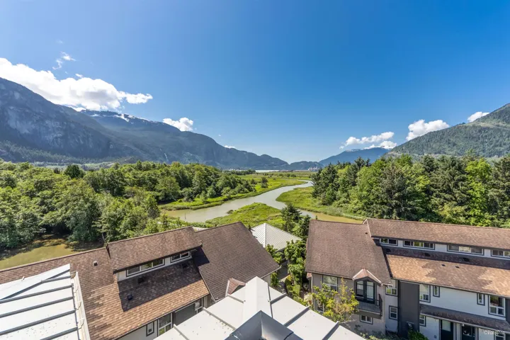 View of mountain backdrop featuring a large body of water