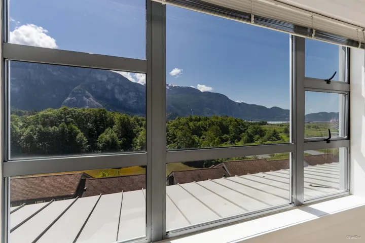 Entryway with a mountain view and plenty of natural light