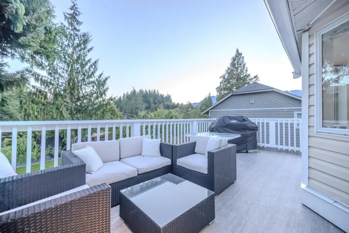 Deck with a grill and a patio area