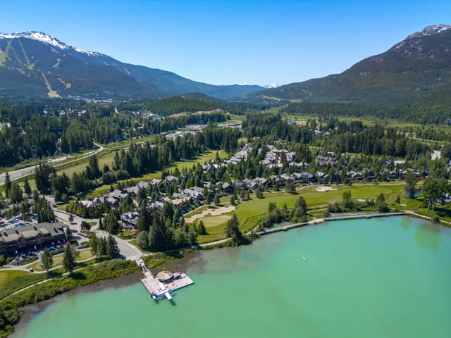 Drone / aerial view with a water and mountain view