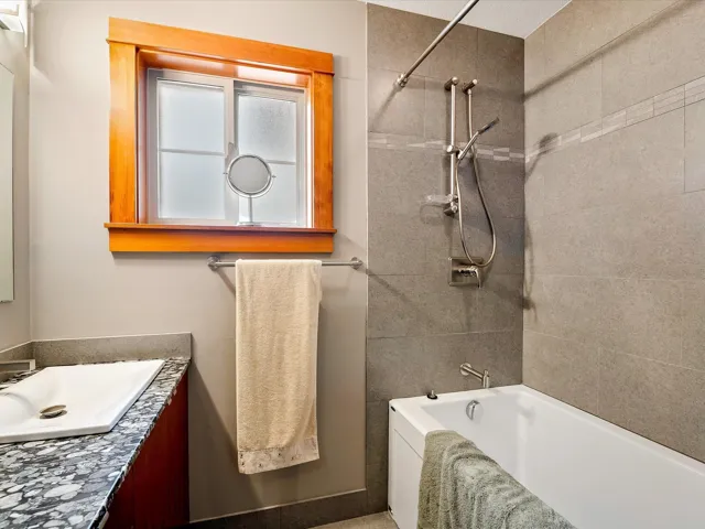 Full bathroom featuring bathtub / shower combination and vanity