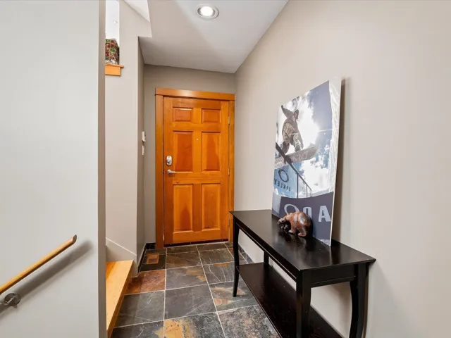 Entryway featuring stone tile floors