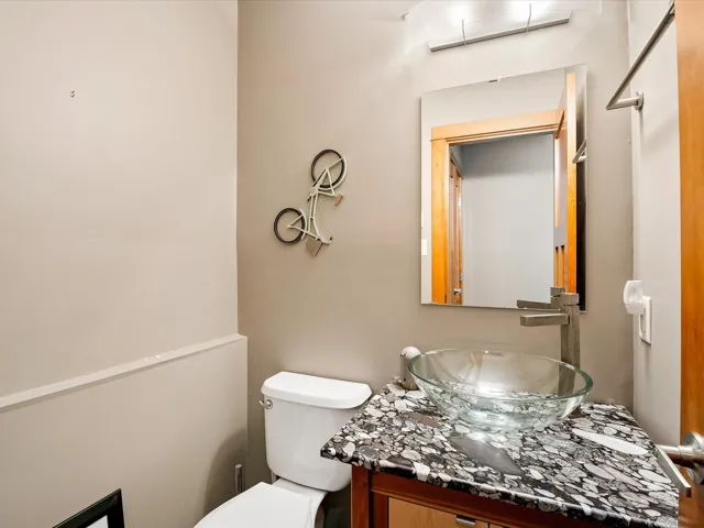 Half bath with toilet and vanity