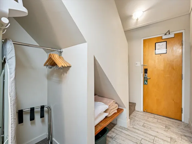 Entryway featuring light wood-style floors and baseboards