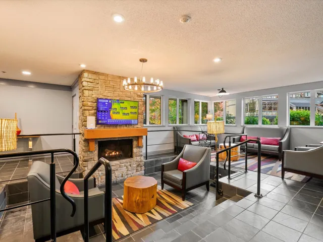 Community lobby featuring a textured ceiling and recessed lighting
