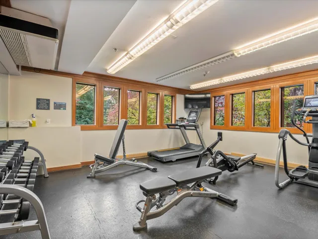 Workout area featuring baseboards