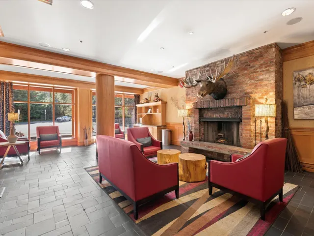 Building lobby featuring wainscoting and recessed lighting