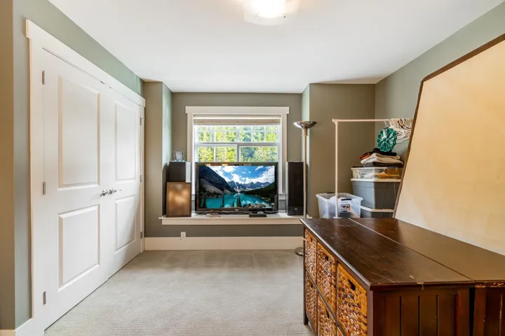 Home office featuring light colored carpet