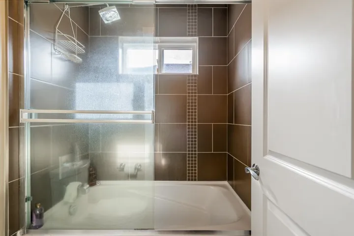 Bathroom featuring tub / shower combination