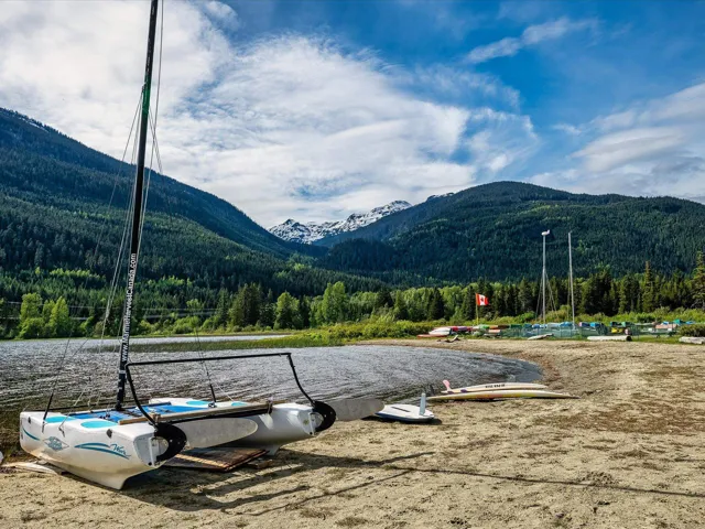 Mountain view featuring a forest and a large body of water