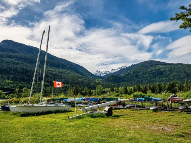 View of mountain background featuring a heavily wooded area
