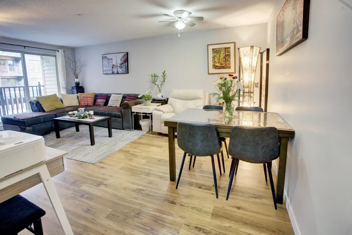 Dining area featuring light wood finished floors and a ceiling fan