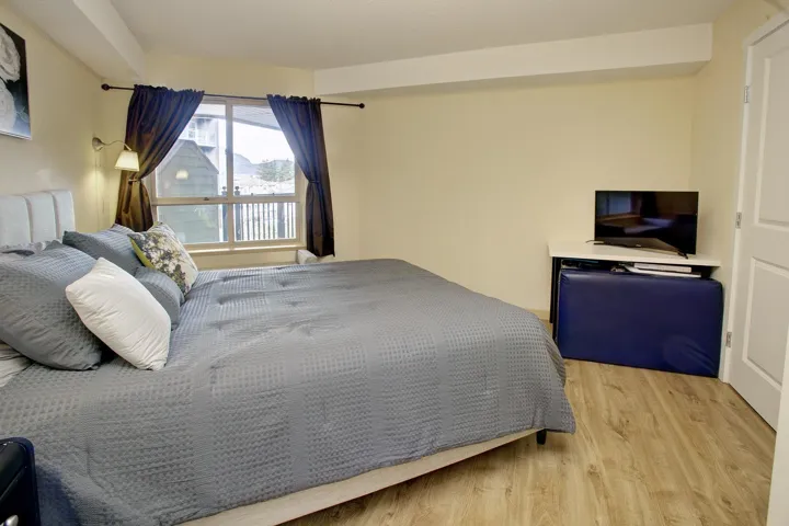 Bedroom with light wood finished floors