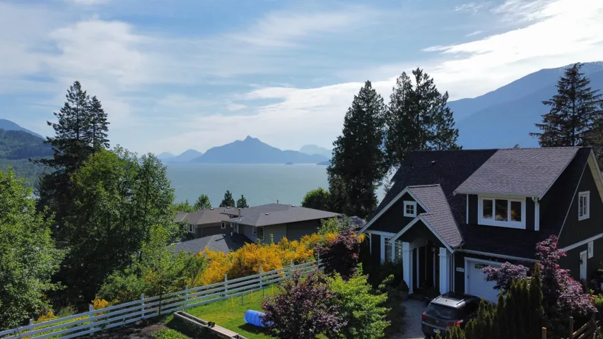 View of mountain backdrop with a nearby body of water