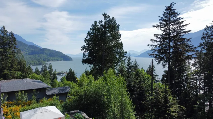 View of mountain backdrop with a large body of water