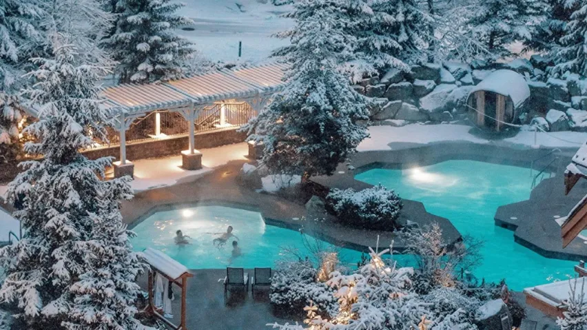 Outdoor pool with a patio area, a jacuzzi, and a pergola