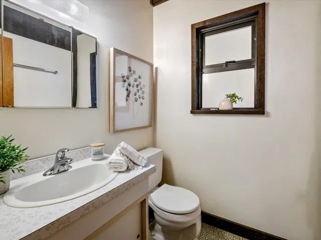 Bathroom featuring vanity and toilet