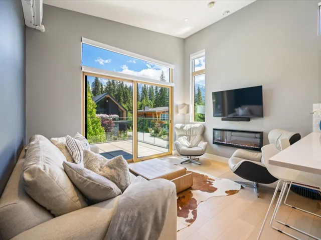 Living room featuring wood finished floors and baseboards
