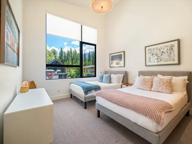 Carpeted bedroom with baseboards