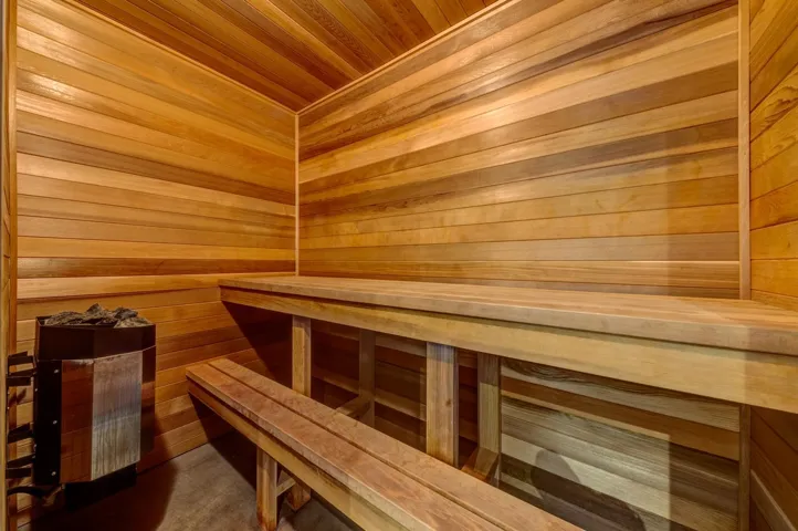 Relaxing sauna with wooden walls and wooden ceiling