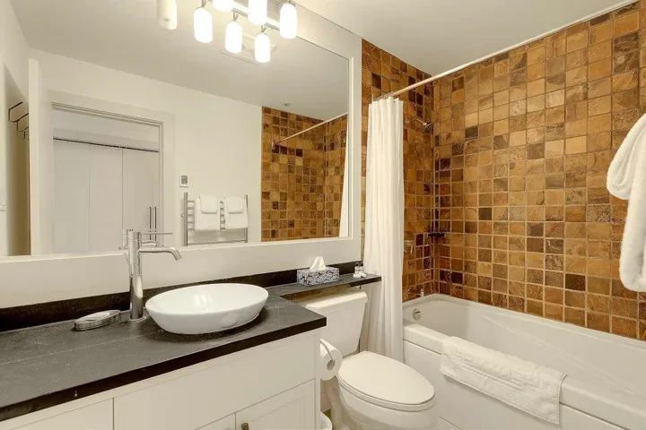 Full bathroom with vanity and shower / tub combo with curtain