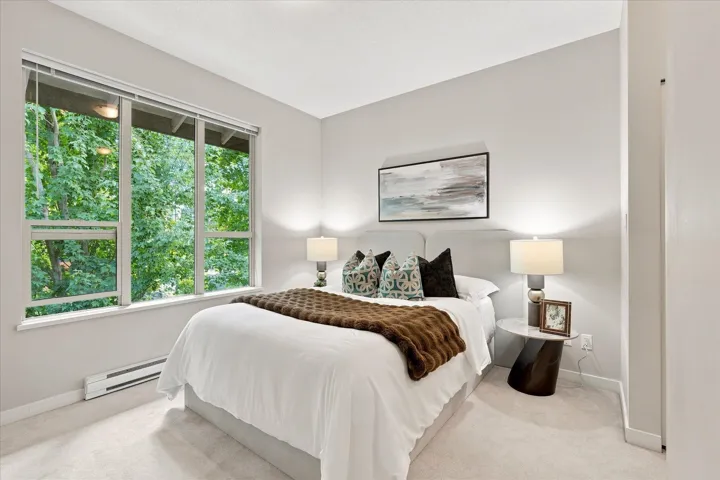 Primary bedroom has a serene private outlook