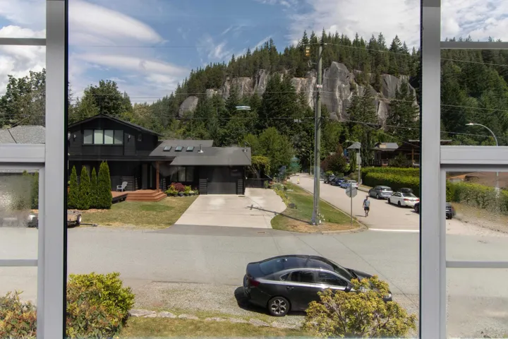 View of asphalt road with street lighting