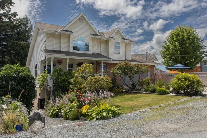 View of front of property with covered porch