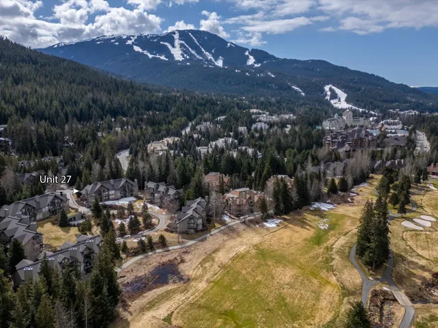Property view of mountains featuring a wooded view