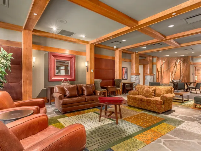 Common area with recessed lighting, beamed ceiling, and coffered ceiling