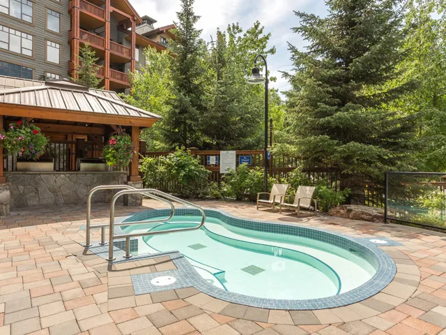 View of pool with a patio, a swimming pool, and a gazebo