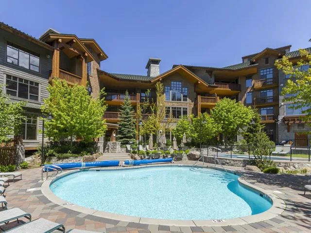 Community pool featuring a patio area