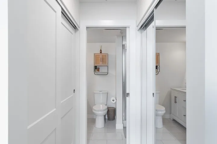 Bathroom featuring light tile patterned flooring and vanity