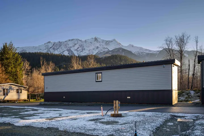 Rear elevation featuring durable cement board siding.