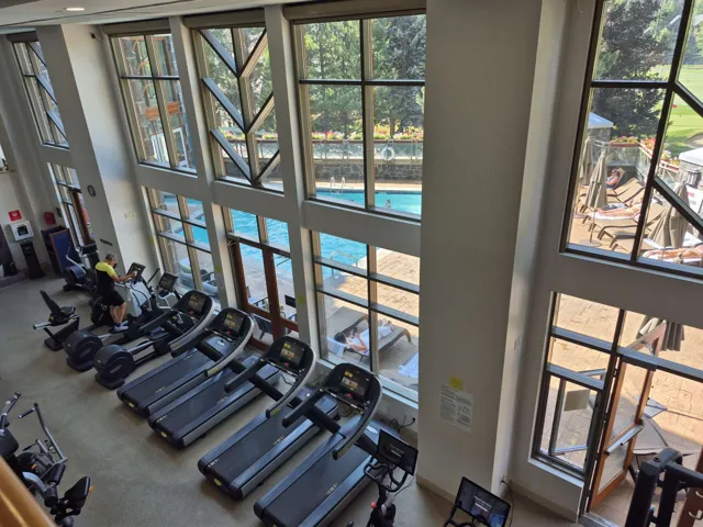 Exercise room featuring a high ceiling